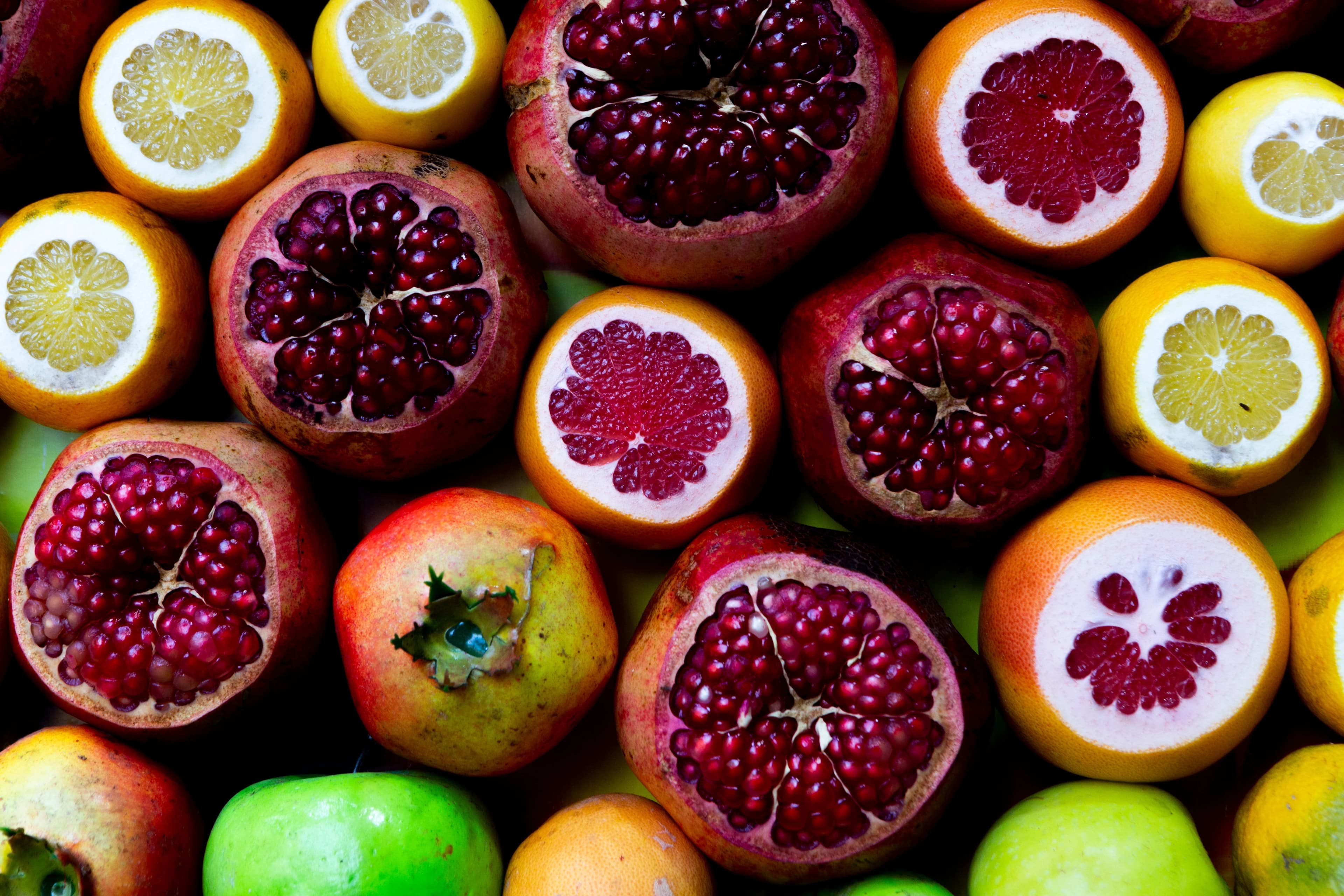 A composition of fruit and pomegranate